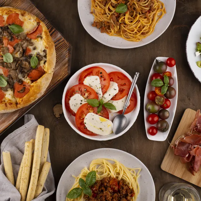 Several dishes with delicious food