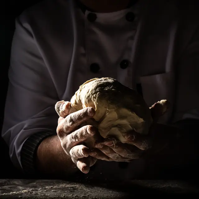 hands baking dough